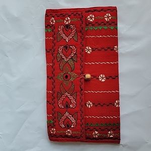 Hand embroidery sustainable clutch